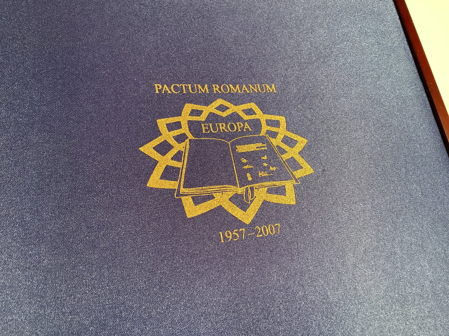 European €2 coin collection in a wooden box