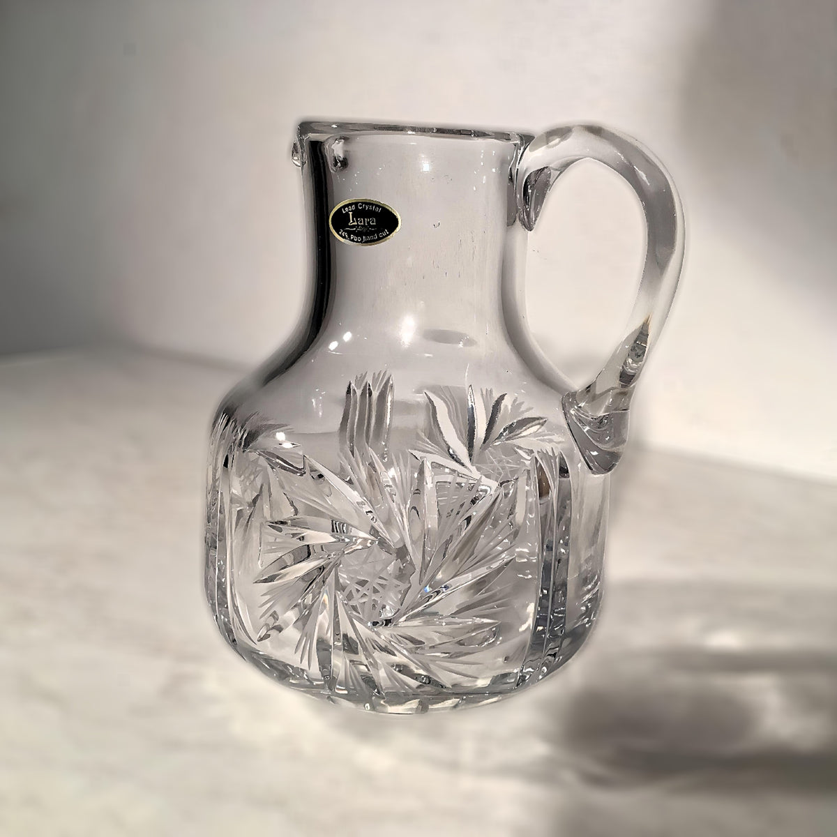 Lead crystal jug, star pattern, 21 cm high