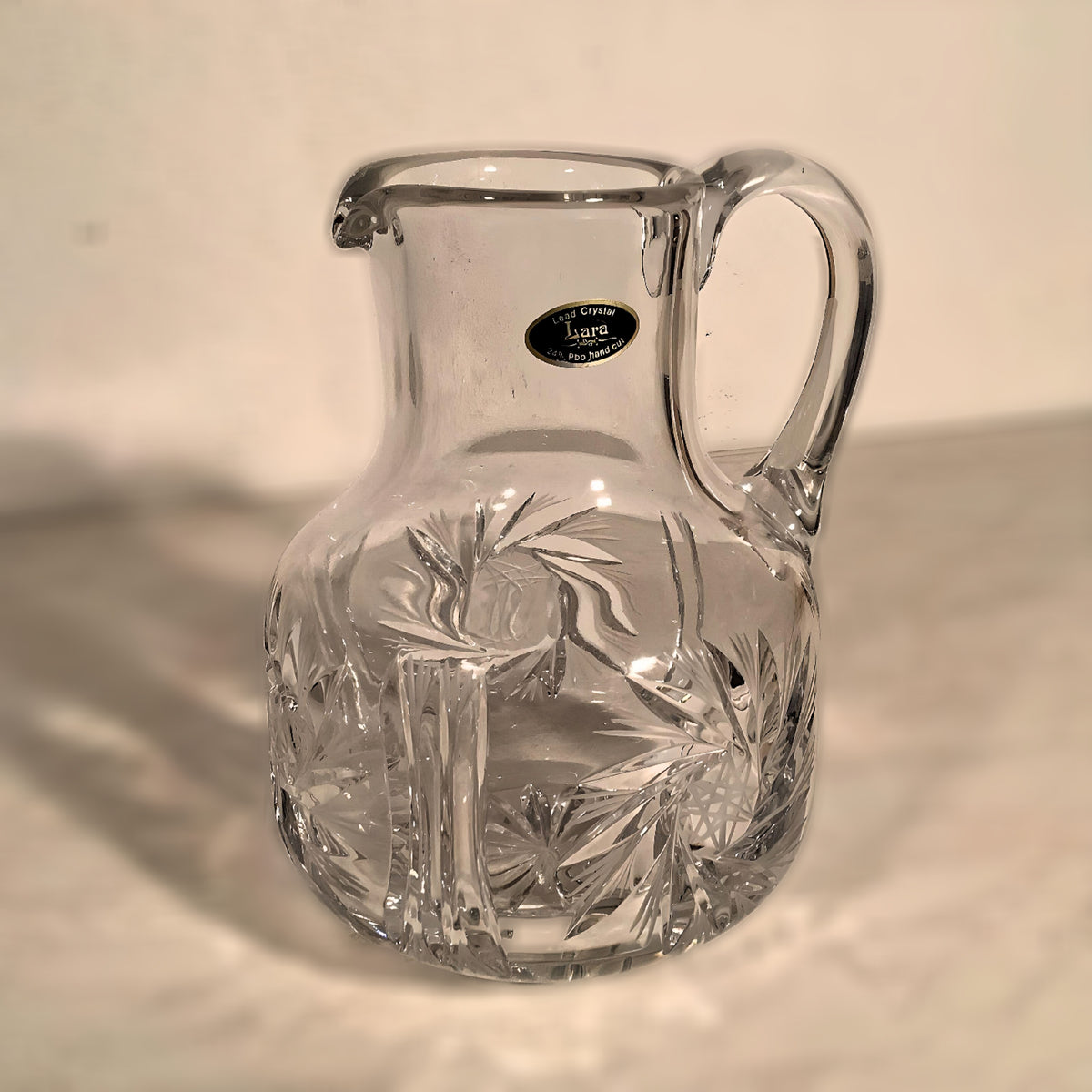 Lead crystal jug, star pattern, 21 cm high